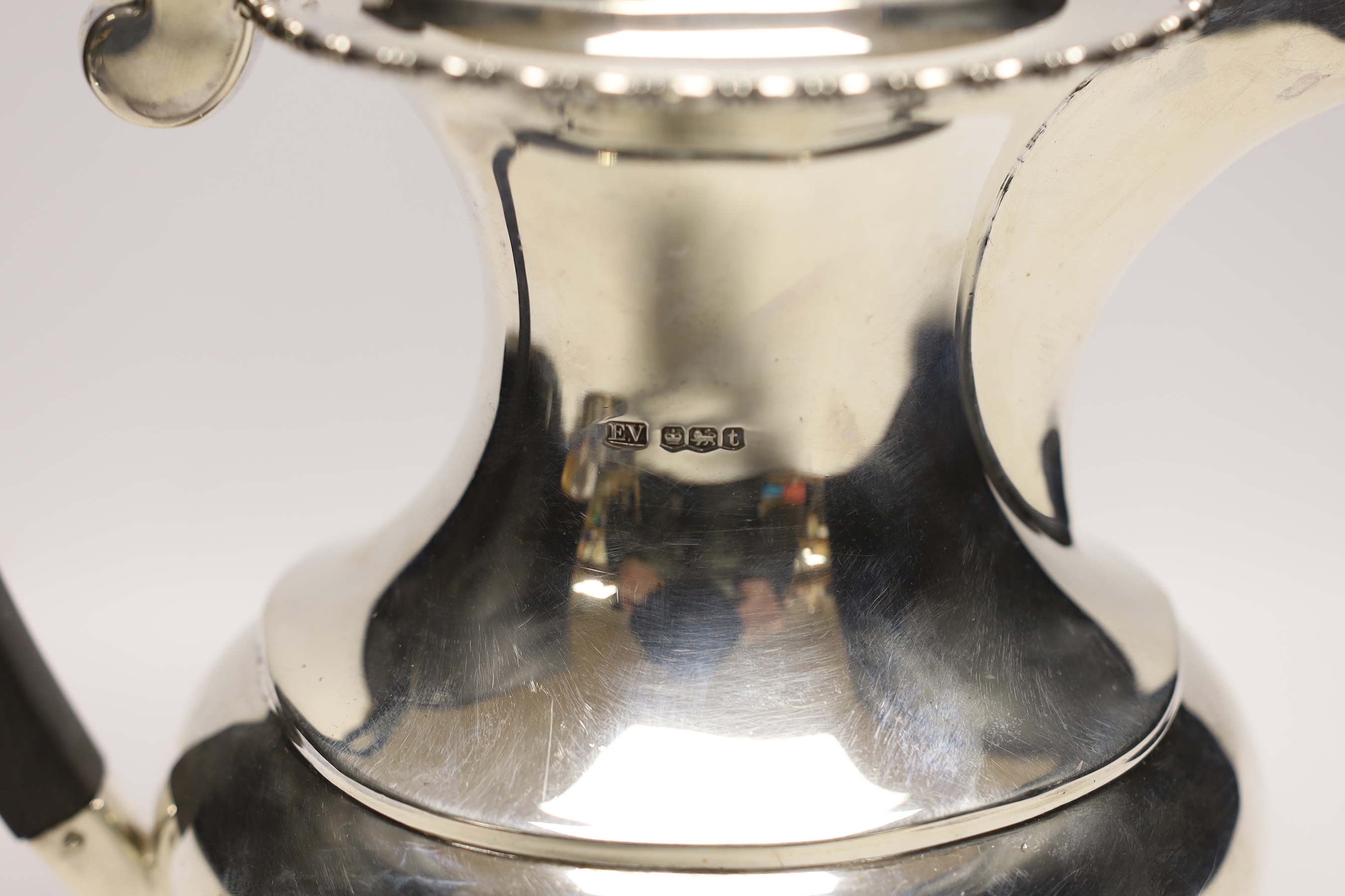 A George V silver hot water pot, Viners Ltd, Sheffield, 1936, gross weight 24.2oz.